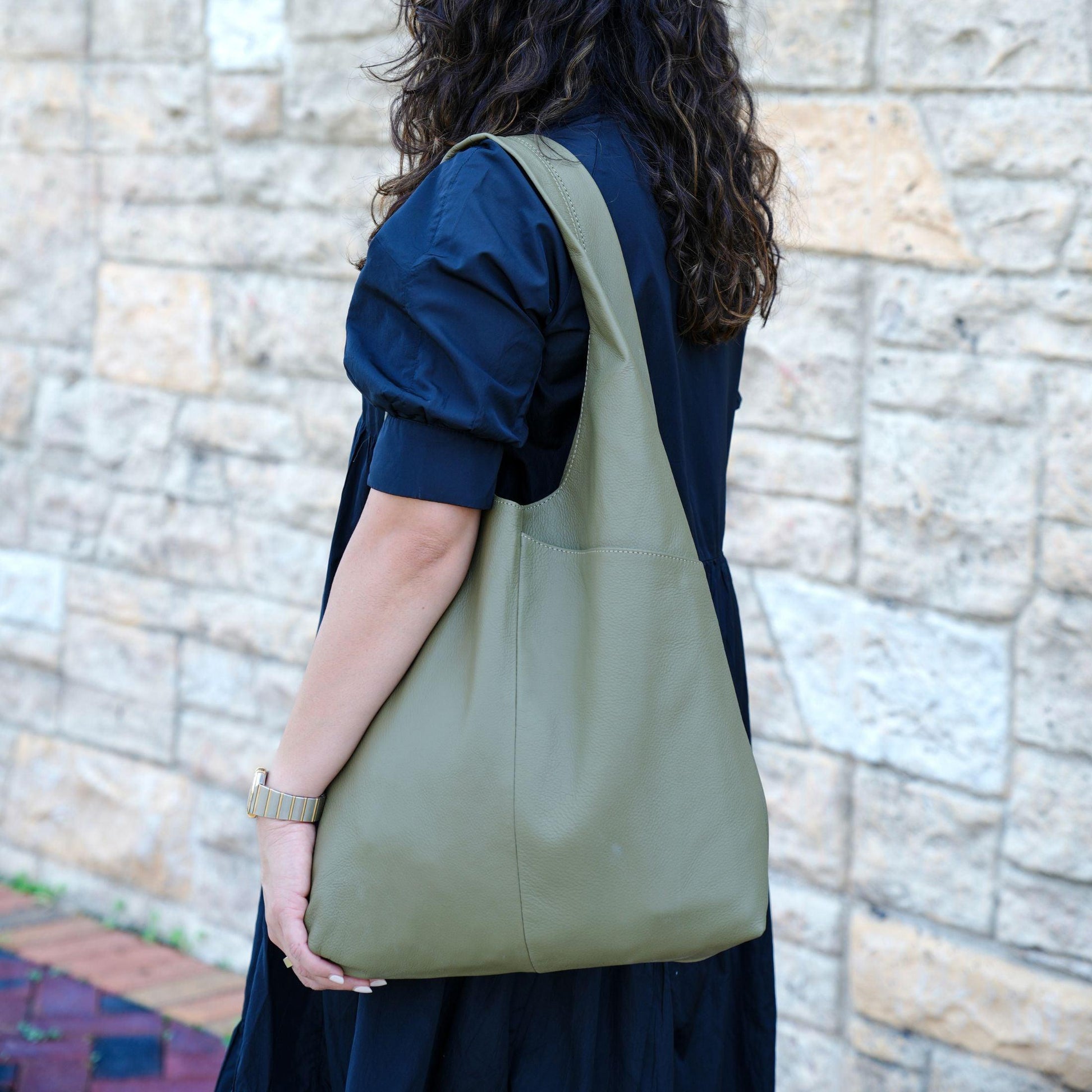 Leather Women's Tote Bag in Olive Green – Stylish and versatile ladies' purse, travel shopping bag, hobo shoulder bag, and multipurpose handbag for everyday use.